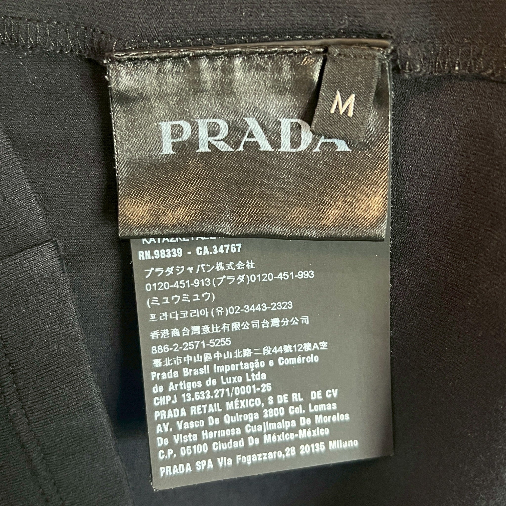 PRADA プラダ ポロシャツ 長袖 ラバーロゴ – REKNOW