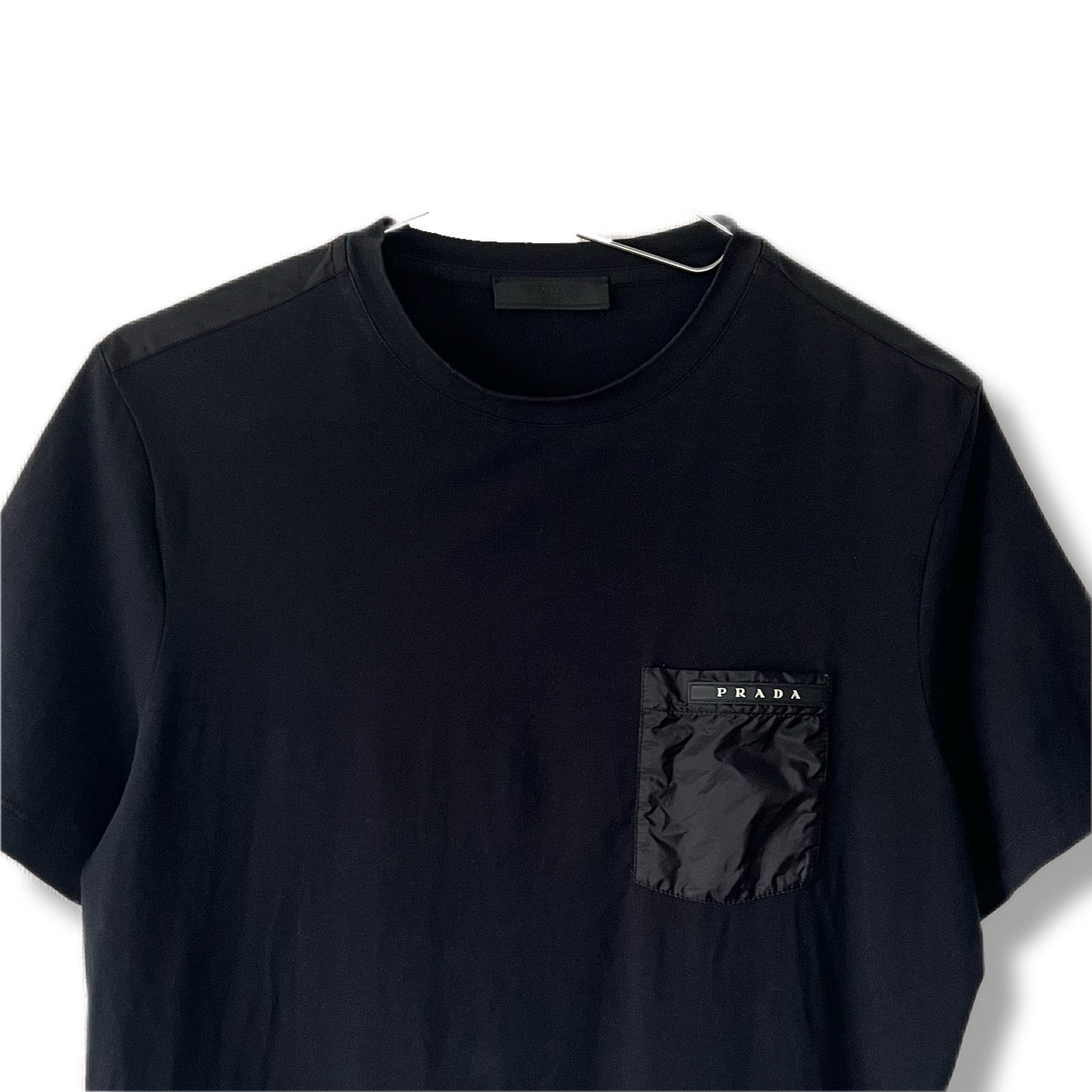 PRADA Prada T-shirt in black nylon with chest pocket and logo plate